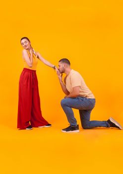 Boyfriend kissing his future wife hand after marriage proposal. Beautiful girlfriend.