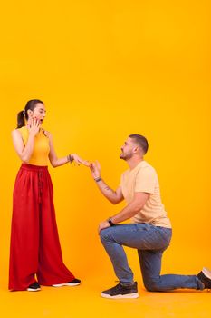 Shocked girlfriend after her boyfriend propose to marry with him. Engagement ring