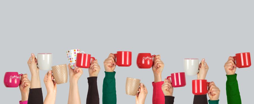 many raised hands up with ceramic cups on a white background, recruitment concept, join our team