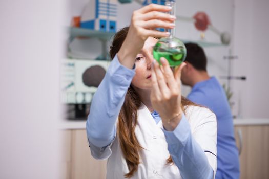 Middle age woman scientist dowing research in agruculture industry. Scientific tests.