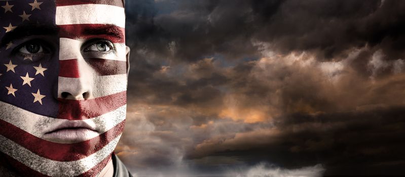 USA rugby player against blue and orange sky with clouds