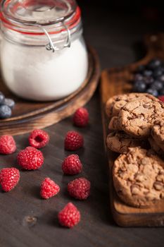 Delicious idea for breakfast with chocolate cookies and fresh bluebarries. Tasty snack.