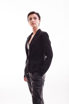 Charming young woman in a stylish black jacket in studio over white background. Gorgeous fashion model.