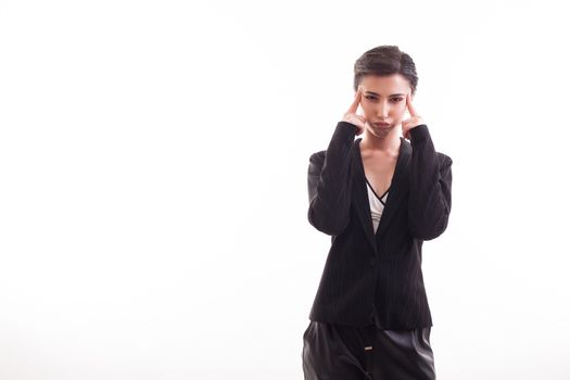 Fashion model with a casual black jacket in studio over white background. Stylish girl.