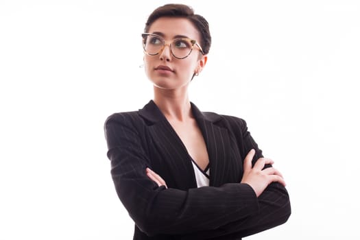 Portrait of cheerful fashion model with glasses wearing a black jacket over white background in studio. Gorgeous young model.