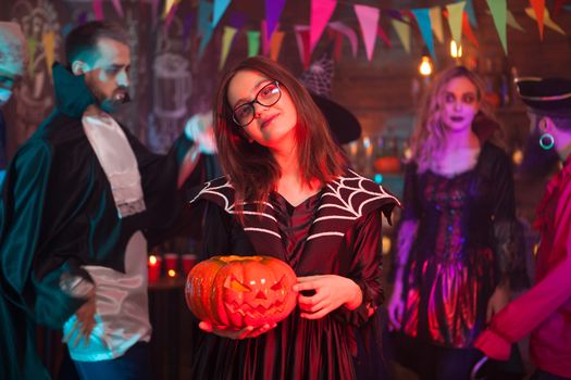 Beautiful young girl smiling to the camera for halloween. Girl with cheerful expression.