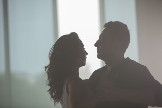 Beautiful couple dancing and enjoying the music in dancing class. Partners interaction. Beautiful performance.