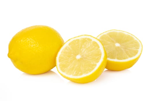 Closeup fresh lemon fruit slice on white background, food and healthy concept