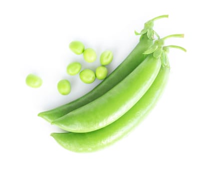 Closeup top view fresh green peas isolated on white background, healthy food concept