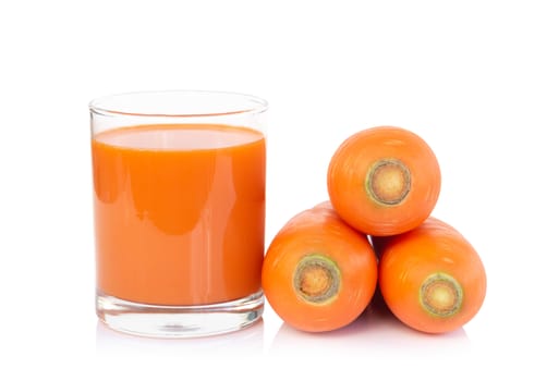 Closeup glass of carrot juice and fresh carrot isolated on white background, healthy diet food drink