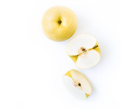 Top view Chinese pear fresh fruit with slices on white background, selective focus