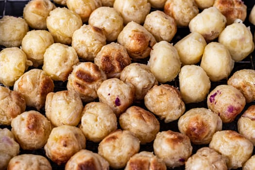 Grilled  sweet potato  on street food stall