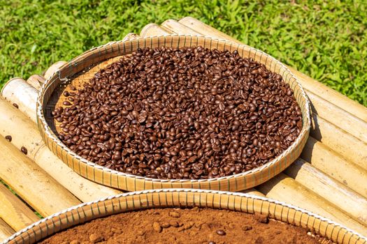 drying coffee beans in bamboo tray