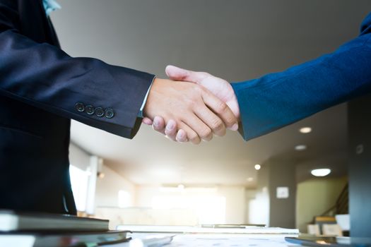 Businessmen handshake; success, dealing, greeting & business partner concepts.