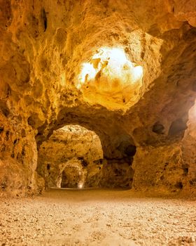 Llighted cave photographed from below