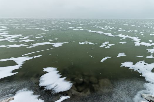 Landscape in winter from a froze lake