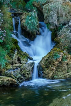 Kravice waterfall in Bosnia and Herzegovina, jets of water falling from a height of twenty-five meters among greenery