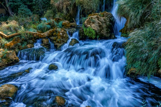 Kravice waterfall in Bosnia and Herzegovina, jets of water falling from a height of twenty-five meters among greenery