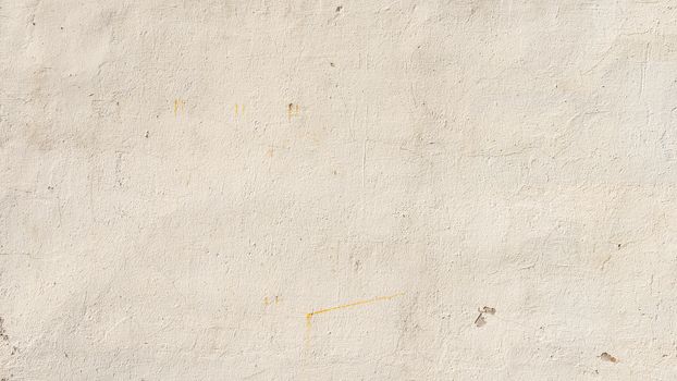 Beige painted wall texture, grungy background with some stains and small cracks.