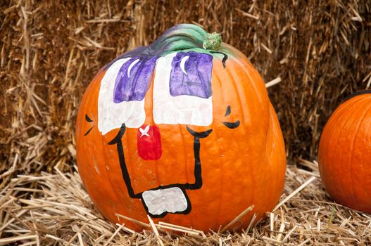 A face painted on a pumpkin