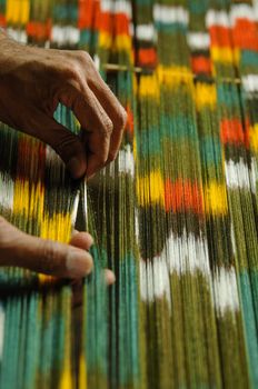 weaving and manufacturing of handmade carpets closeup