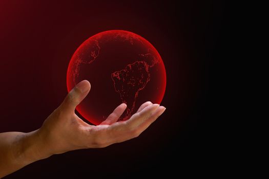 Global crisis concept. Transparent red earth on human hand on red and dark background. with copy space. World critical warming, corona virus from human. 