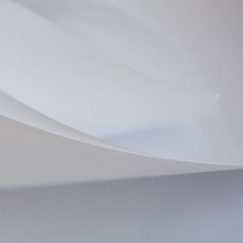 abstract background of a twisted sheet of white paper