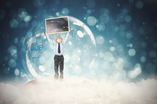 Festive child in snow globe against blue abstract light spot design