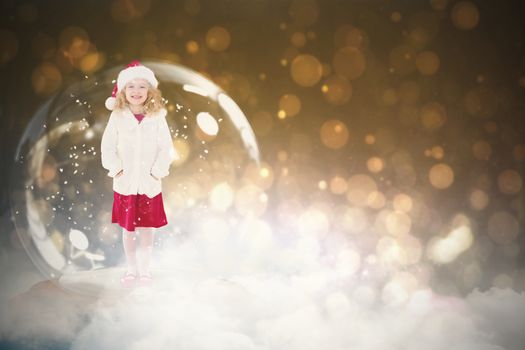 Festive child in snow globe against dark abstract light spot design