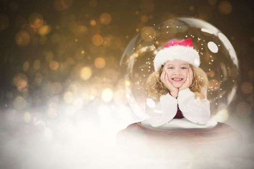 Festive child in snow globe against dark abstract light spot design