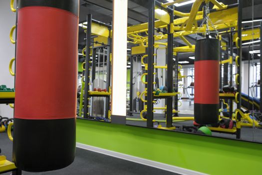 close up of a boxing bag in front of a mirror