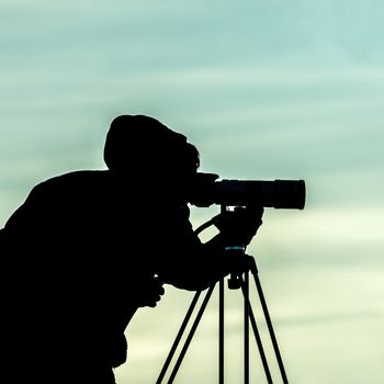 Portrait of a photographer during autumn photography outdoors