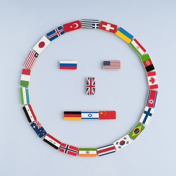 illustration of a smiley face from national flags on dominoes. Concept of peace and the Commonwealth of Nations and the world order