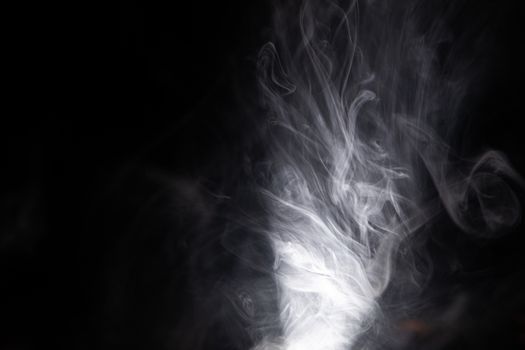 A smoke isolated on a black background - cool for wallpapers