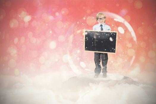 Festive child in snow globe against red abstract light spot design