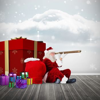 Santa looking through a telescope against clouds in a room