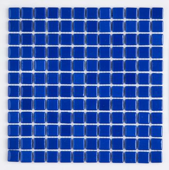 little blue ceramic tile, top view, majolica. for the catalog