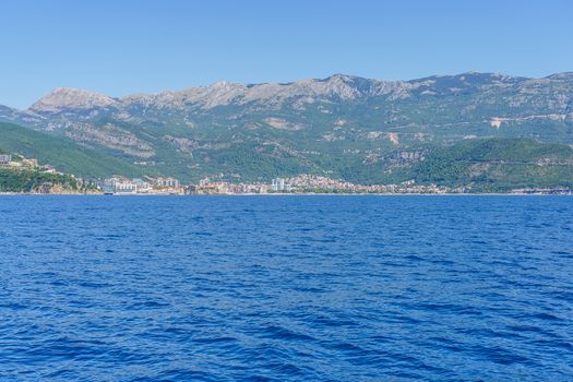 Budva Riviera in Montenegro, view from the sea on a sunny summer day