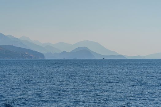 Budva Riviera in Montenegro, view from the sea on a sunny summer day