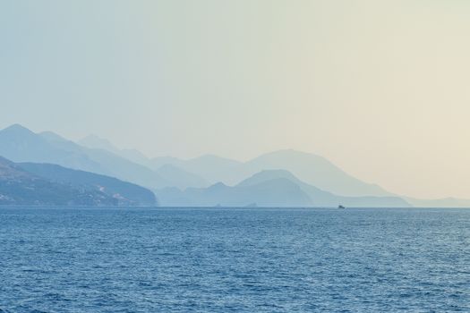 Budva Riviera in Montenegro, view from the sea on a sunny summer day