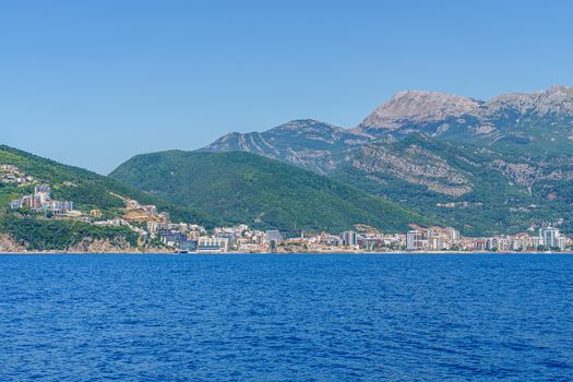 Budva Riviera in Montenegro, view from the sea on a sunny summer day