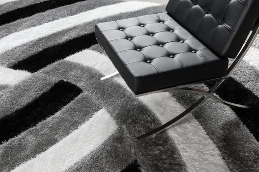 modern soft chair on the carpet