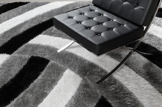 modern soft chair on the carpet