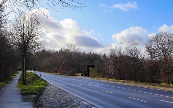 Beautiful view on countryside roads with fields and trees in northern europe.