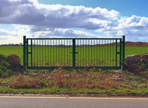 Beautiful view on countryside roads with fields and trees in northern europe.