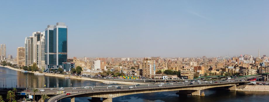 Panoramic view of the 15th May bridge, the Nile river & the Corniche Street in central Cairo.