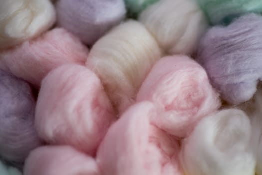 Macro shot of pastel colored cotton wool