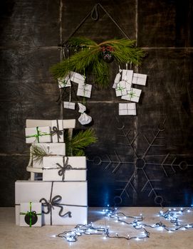 New Year and Christmas decorations Gift boxes on a dark background
