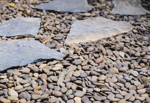 Garden pathway decoration of stone and gravel