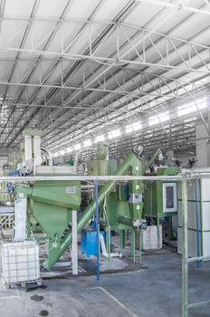 factory equipment for processing and recycling of plastic bottles. PET recycling plant